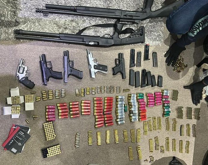 Two drug dealers aged 50 and 19 found with illegal guns and bullets